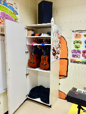 Ukulele Storage Rack in Closet by Charles Van Deursen